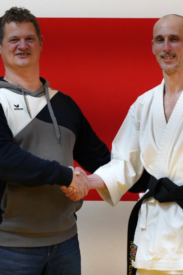 Jörg Fackler gratuliert Bayerischem Meister.