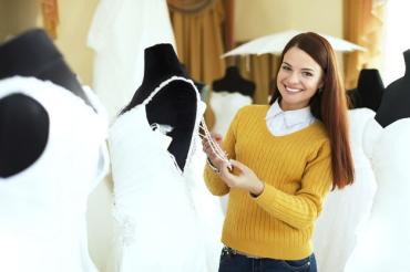 beautiful bride chooses bridal gown