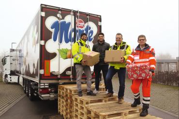 Das Bild zeigt Oktay Sancak, Caner Akgün, Fahrer Tom Frede und Markus Kristen. 