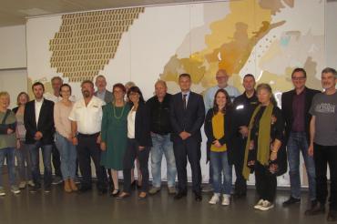 Das Bild zeigt ein Gruppenfoto des Ehrenamtlichentreffen in der Justizvollzugsanstalt Niederschönenfeld