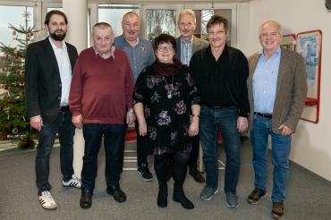 Geehrte Angestellte mit Geschäftsleitung Firma Arlt