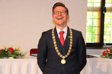 David Wittner, lachend, mit Amtskette