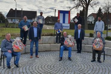 Das Bild zeigt die geehrten Mitarbeiter der Tannhauser Straßen- und Tiefbau GmbH. 