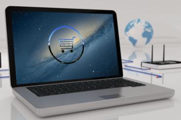 Stilisierter Laptop mit Einkaufswagen-Symbol