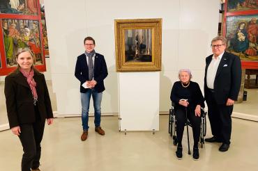 Das Bild zeigt die Übergabe des Gemäldes " Die Kanzlei von St. Georg zu Nördlingen".