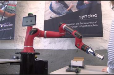 Das Bild zeigt Eindrücke aus dem Vortrag zur Digitalisierung. 