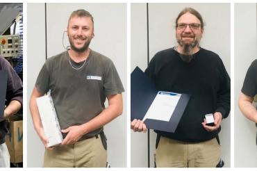 Das Bild zeigt die geehrten Mitarbeiter. 