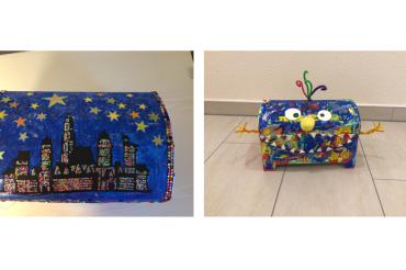 Das Bild zeigt die Schatzkisten von Elisa und Jakob