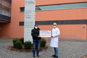 Das Bild zeigt Bauunternehmer Robert Meyer (links im Bild) und Dr. Thomas Klaus Schmitt (rechts).