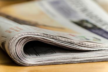 Das Bild zeigt eine Zeitung.