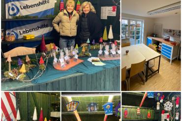 Das Bild zeigt die Weihnachtsmarktbude der Tagesstätte und Anne-Maria Dittes (links) und Veronika Hagl (rechts) sowie einen Einblick in den Ergotherapie-Raum.