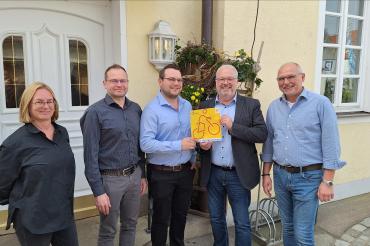 Fünf Personen, 4 Männer und eine Frau