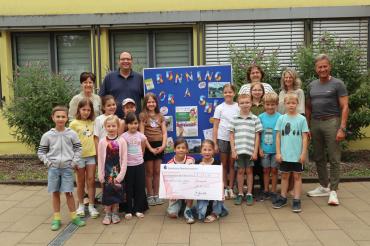 Spendenübergabe Running for a smile