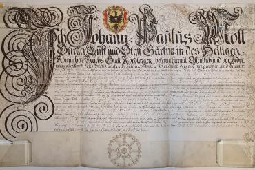 Urkunde im Stadtarchiv Nördlingen: Lehrbrief für Johann Kaspar Moll, ausgestellt von seinem Vater Johann Paulus Moll, Lust- und Stadtgärtner der Reichsstadt Nördlingen, 1714.