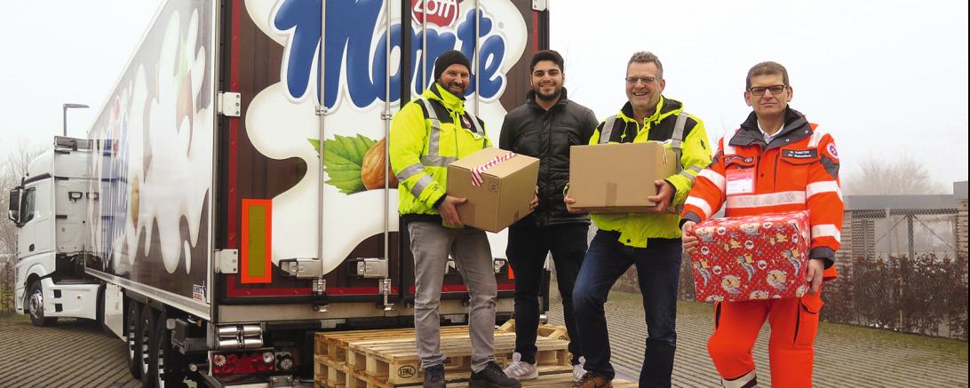 Das Bild zeigt Oktay Sancak, Caner Akgün, Fahrer Tom Frede und Markus Kristen. 