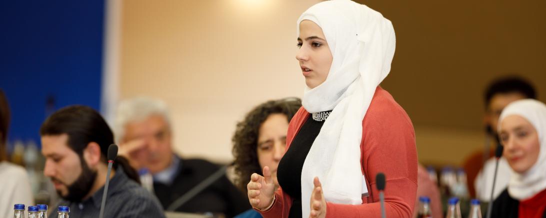 Das Bild zeigt eine Teilnehmerin. 