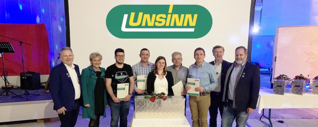 Das Bild zeigt v.l.n.r.: Geschäftsleitung Josef und Rosa Unsinn, Ludwig Hauptmann, Andrzej Tomanek, Franziska Gumpp, Jakob Löffler, Markus Moser, Personalleiter Herbert Aggensteiner und Geschäftsführer Gunnar Bregler