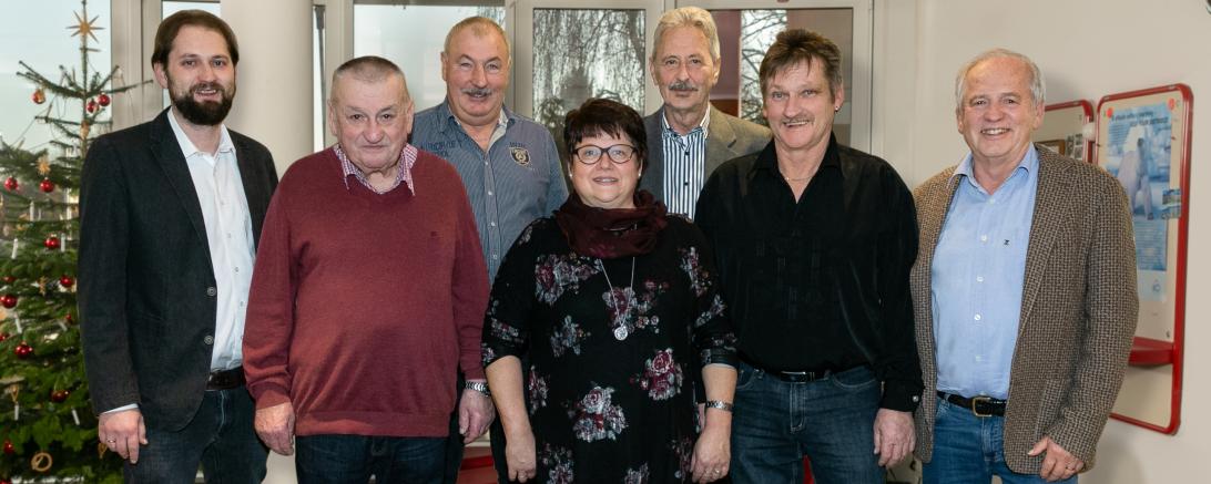 Geehrte Angestellte mit Geschäftsleitung Firma Arlt