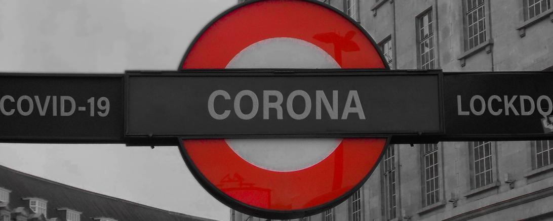 Das Bild zeigt ein Corona Stoppschild.