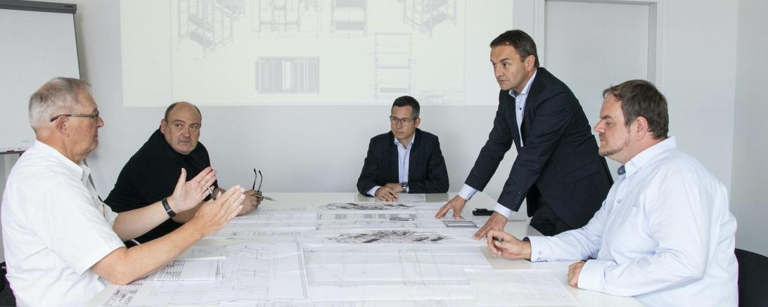 Das Bild zeigt die Firmenübernahme.