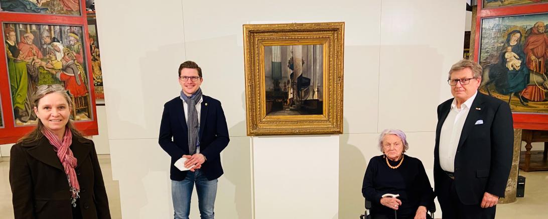 Das Bild zeigt die Übergabe des Gemäldes " Die Kanzlei von St. Georg zu Nördlingen".