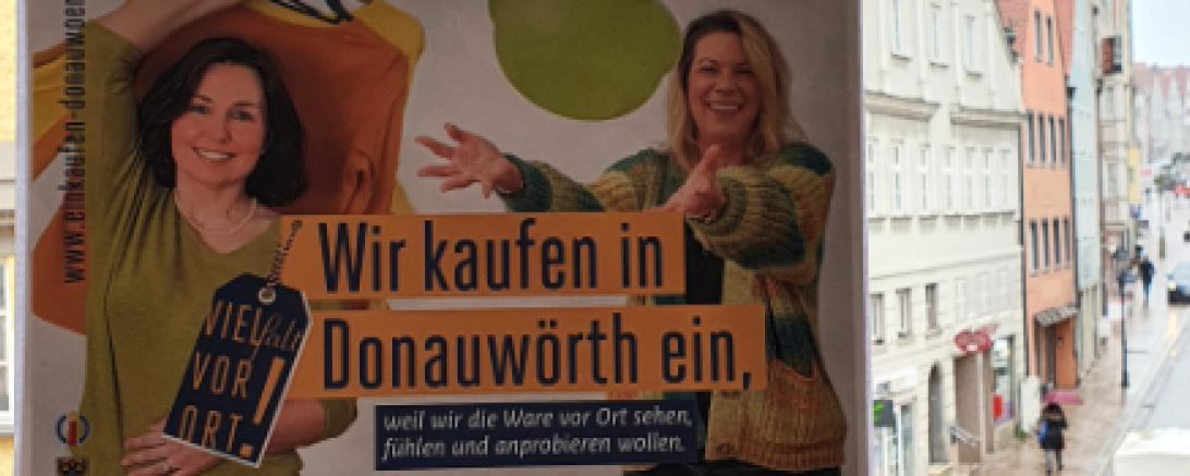 Das Bild zeigt einen Ausschnitt vom Plakat. Darauf steht "Wir kaufen in Donauwörth ein"