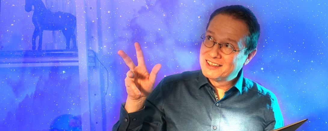 Das Bild zeigt den Autoren TINO bei einer Vorlesung für Kinder. 