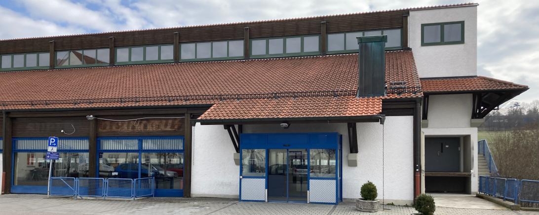 Außenansicht Supermarktgebäude in der Stadtresidenz. 