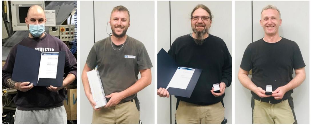 Das Bild zeigt die geehrten Mitarbeiter. 