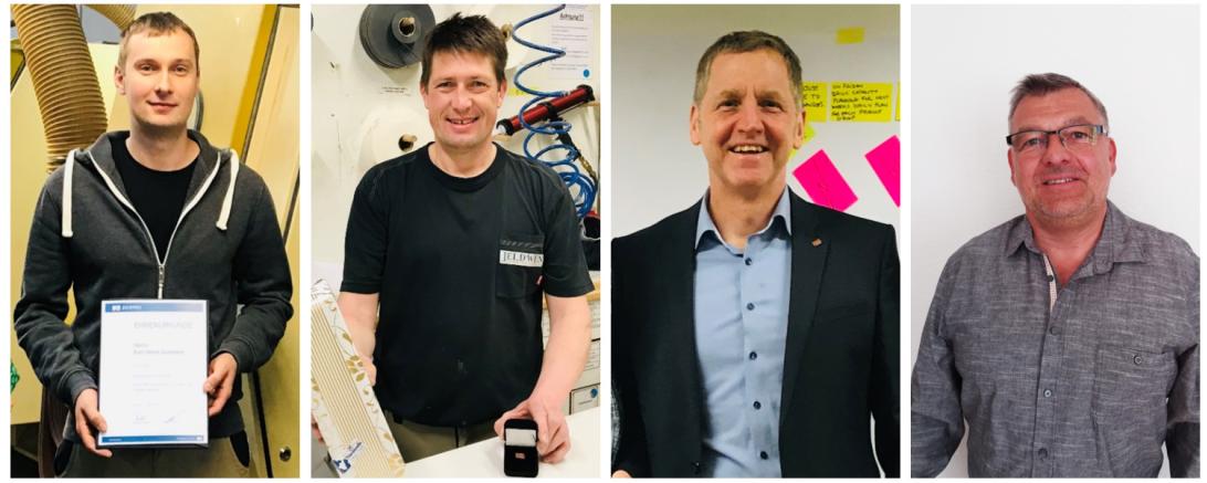 Das Bild zeigt die geehrten Mitarbeiter. 