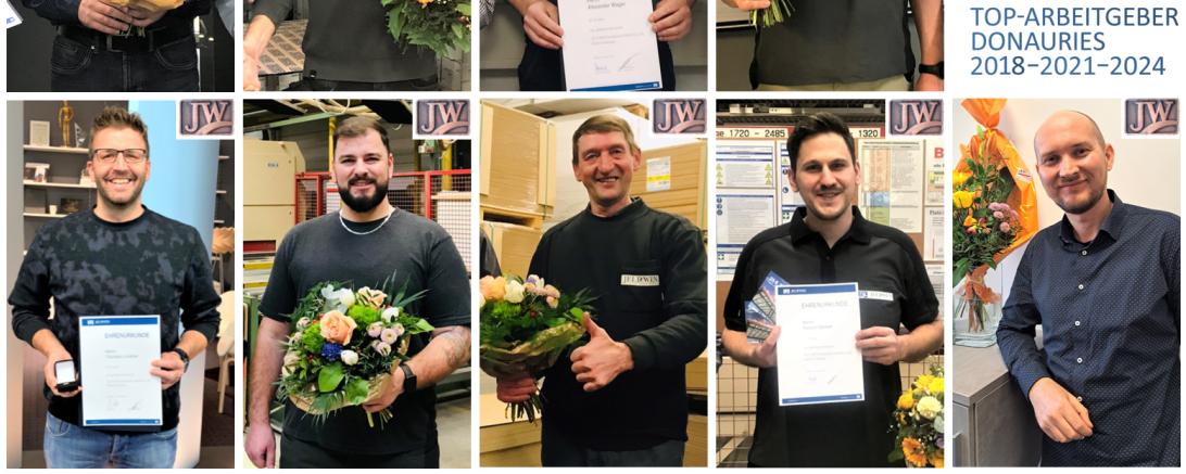 Die stolzen Mitarbeiter bei der Ehrung.