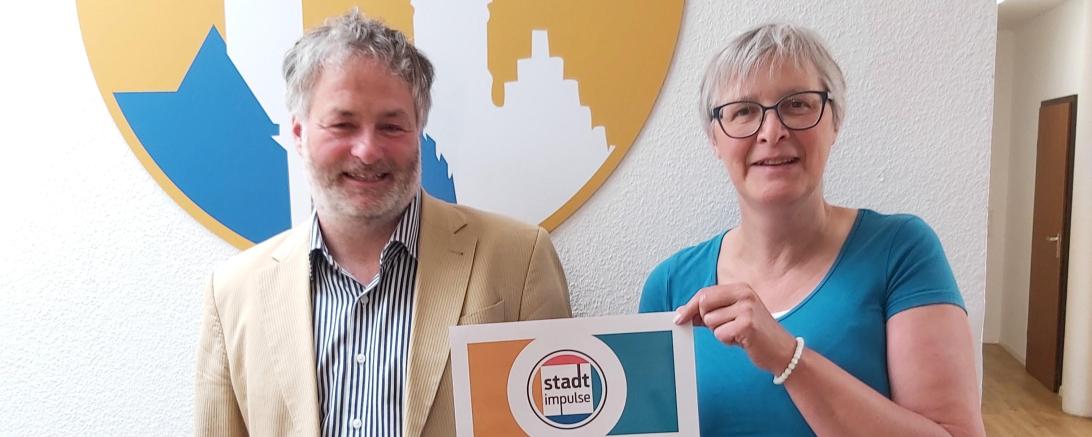 v.l.: Oliver Sporr (ehrenamtl. Geschäftsführer des Stadtladens) und Christiane Kickum (Geschäftsf. Vorsitzende CID).