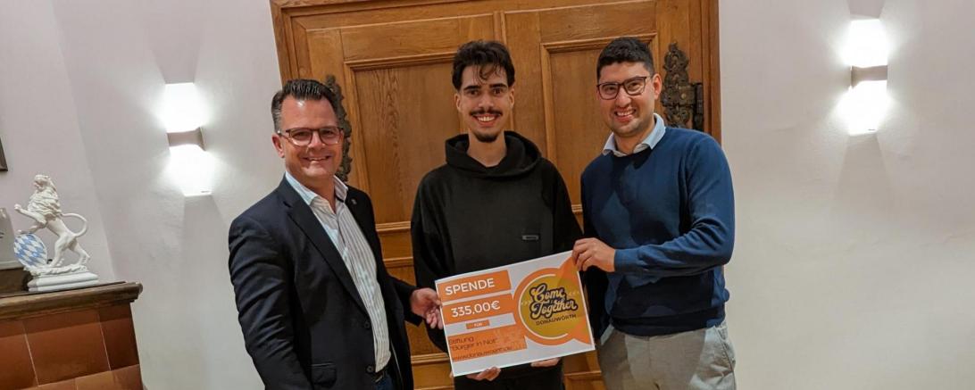 Auf dem Bild sind OB Jürgen Sorré, Mikail Dincer und Sebastian Heckl zu sehen.