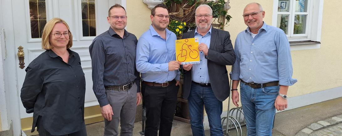 Fünf Personen, 4 Männer und eine Frau