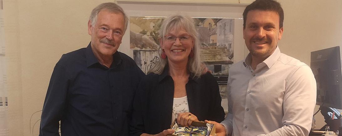 Dr. Andreas Hörger, Susanne Hörger und Harburgs Bürgermeister Christoph Schmidt. 