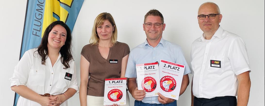 : Julia-Sophia Ernst-Hausmann (Vth-Verlag), Eva-Maria Deutsch und Richard Deutsch (PowerBox-Systems), Uwe Puchtinger (Vth-Verlag)