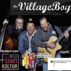 Im Bild sind the Village Boyz zu sehen.